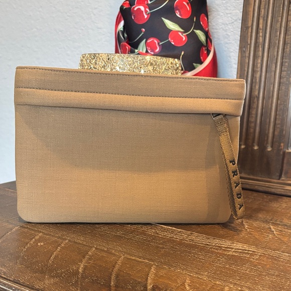 Prada Beige Wristlet/clutch with Gold Accent 8”X5” - Picture 1 of 9